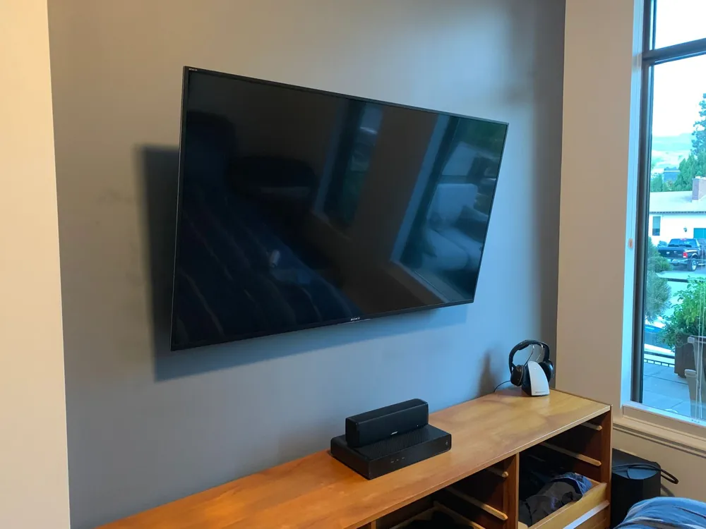 TV installation in a bright living room